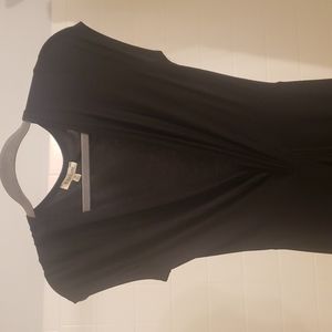 Black cotton dress with cap sleeves, deep V, slit, under skirt